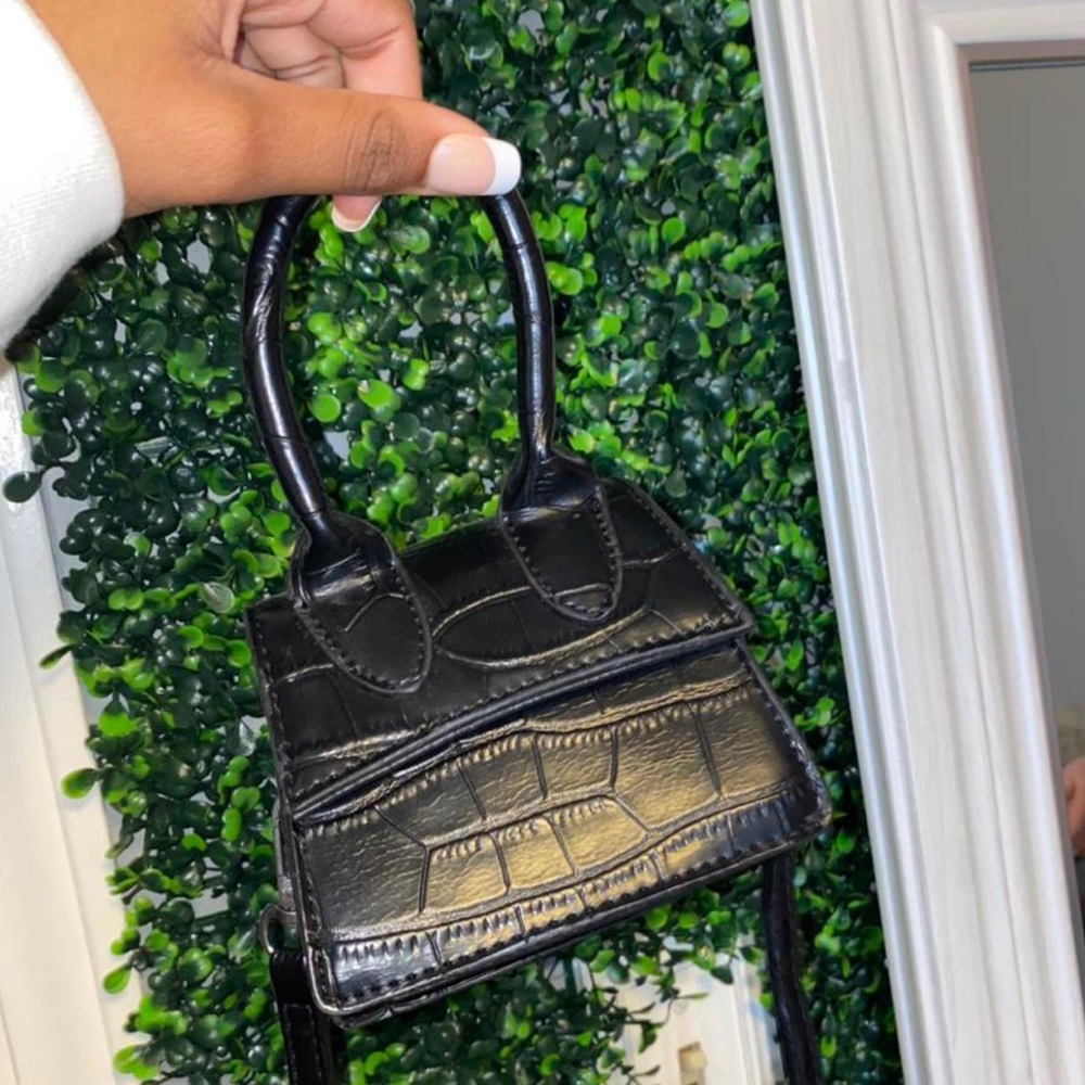 Small black purse with strap